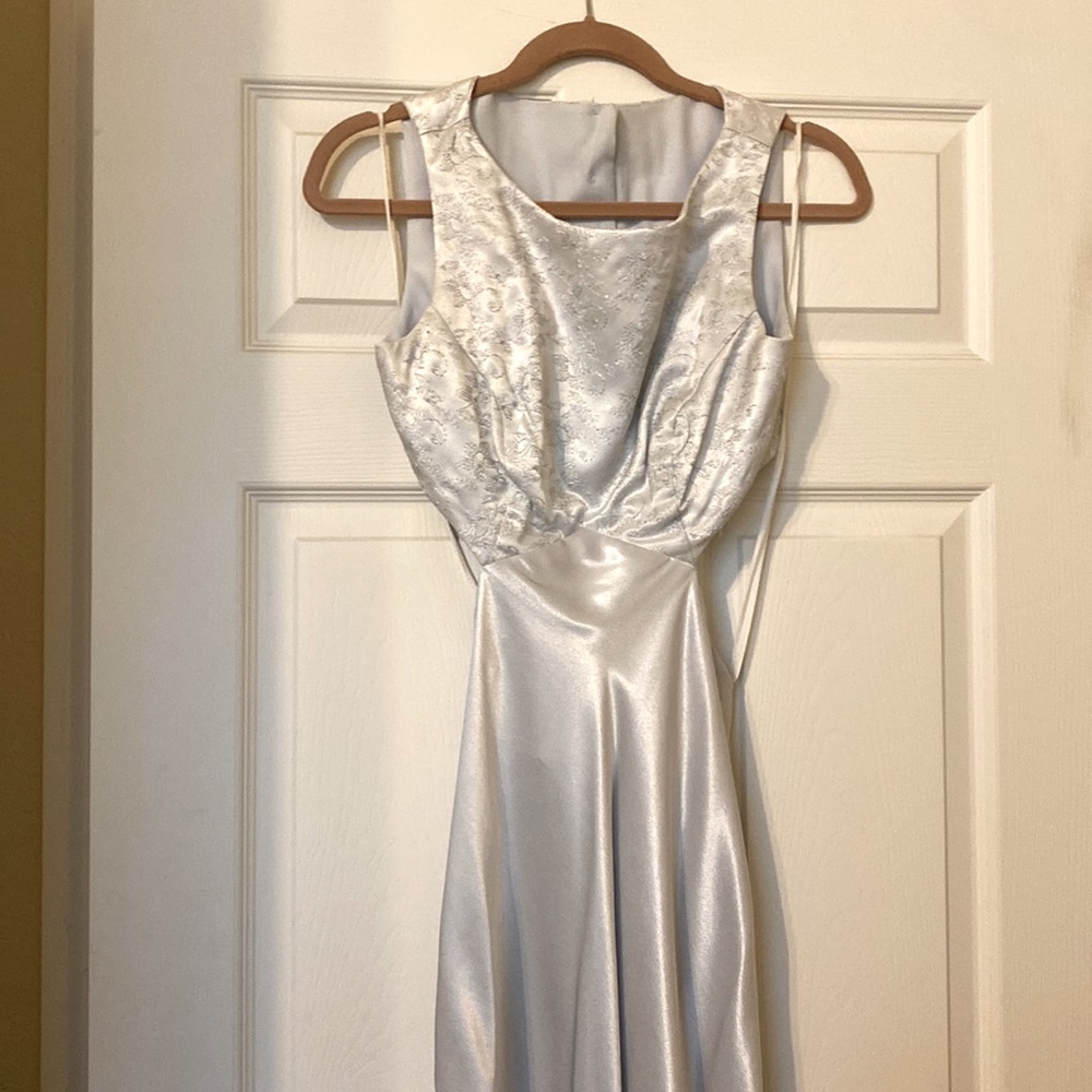 Long light light blue cut-out party dress.